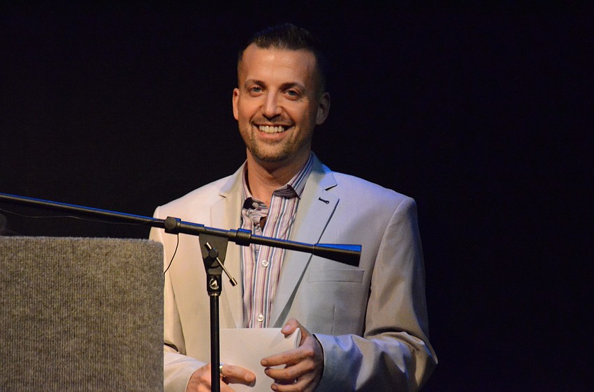Joey Panek emcees the eveningâ€™s event
