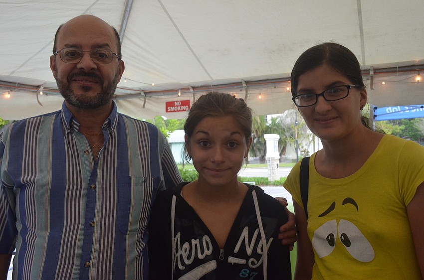 Hector Zayas with his daughter Tiffani Geaves and Gladys Zayas come out to support the center and sample some great food.