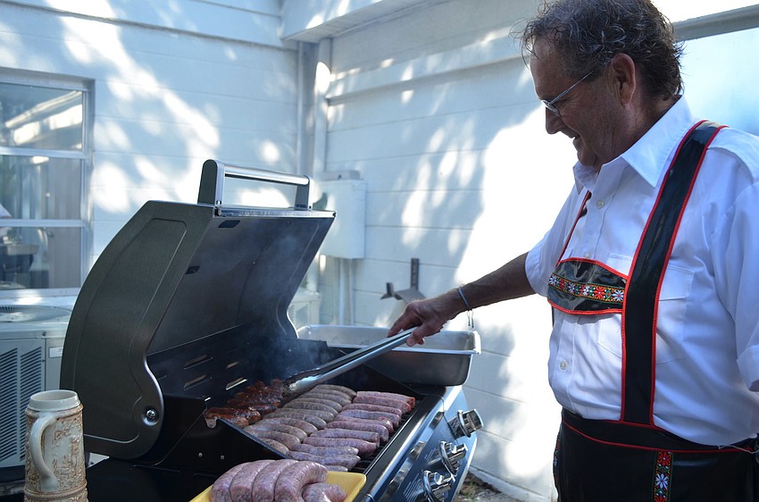 Grill master Bill Evanko at the Longboat Island Chapel Oktoberfest.