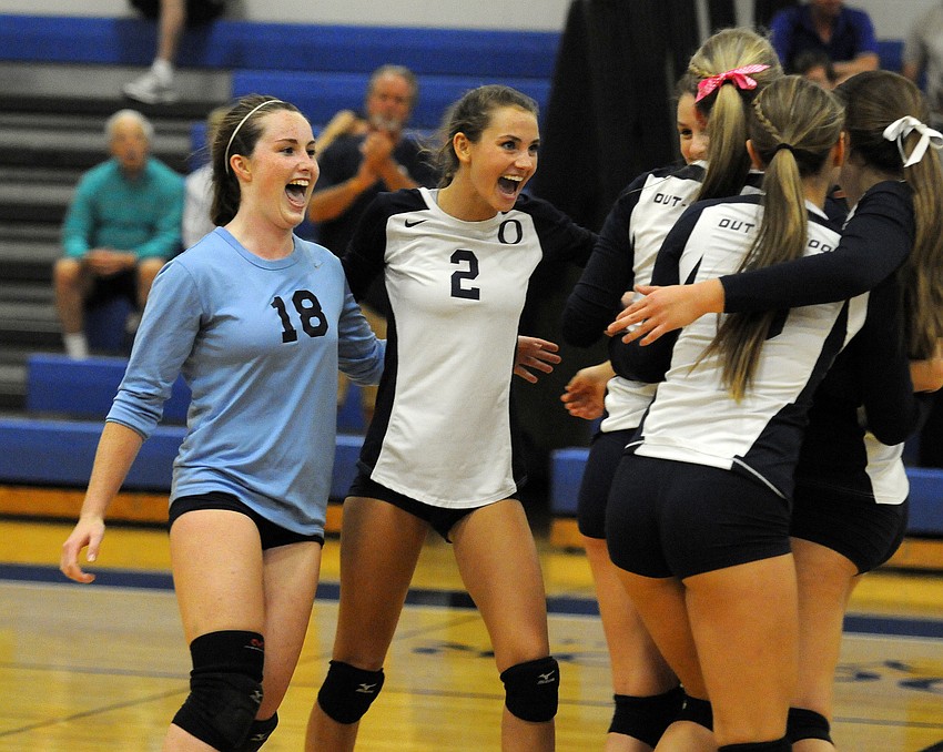 The ODA volleyball team celebrates after defeating Calvary Christian 3-1 in the Class 3A-Region 3 quarterfinals Oct. 29.