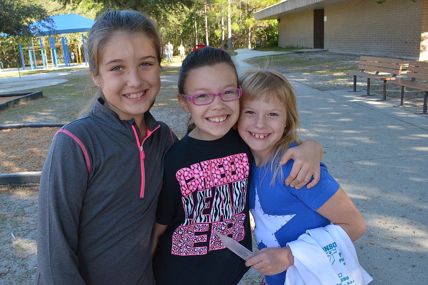 Amanda Amos, Brooke Gore and Alexis Vanbutsel enjoyed the beautiful weather.