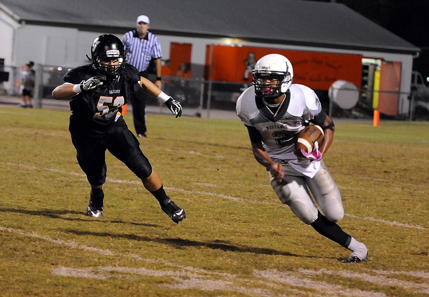 Lakewood Ranch junior Cameron Pearcey scrambles for yardage in the fourth quarter.