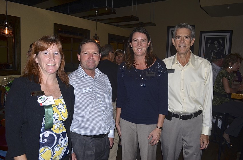 Allison Levy, Brad Severson, Tara Brocke and Craig Cerreta squeeze in for a photo opp.