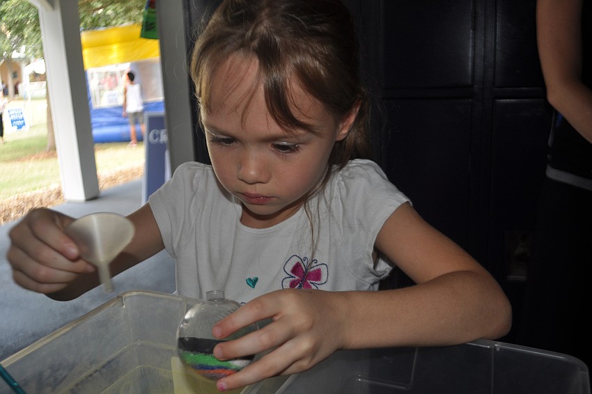 Sadie Miller, 6, made a sand-filled baseball.