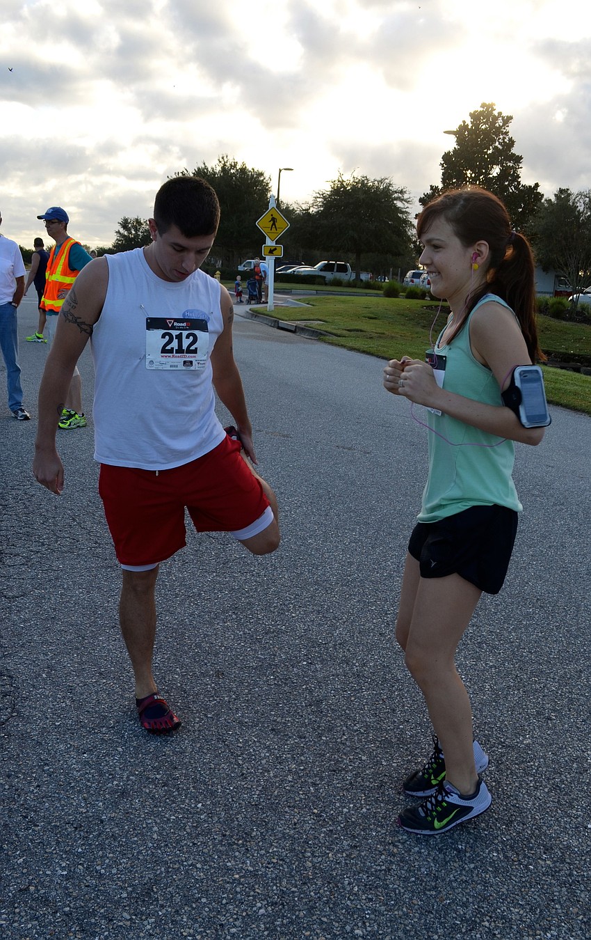 Ray and Lindsay Tuttle warm up.