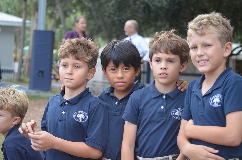 Giovanni G., Arlo H. ,Drew H. and Oliver G. watch the game
