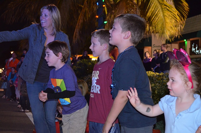 Sawyer Grantham, Cash Lewis, Hunter Byrner and Dylan Grantham cheer on Sunshine the Clown.