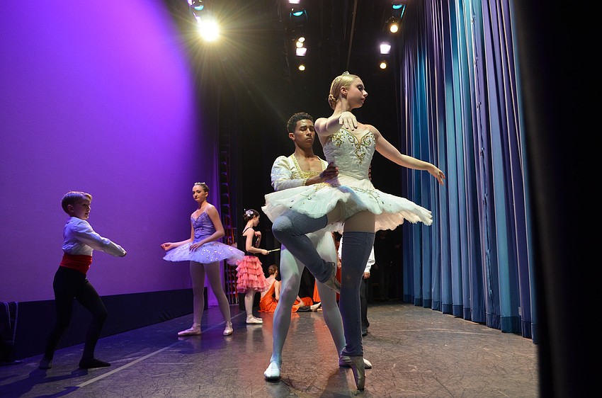 Yamil Maldonado and Caitlin Gish get some last-minute practice in before the finale