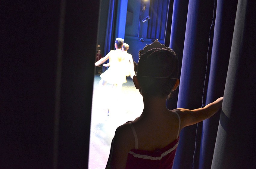 Olivia Ratner watches Jayden Capella and Katherine Acosta perform the Cupid Variation from The Don Quixote
