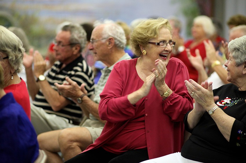 Mary Elizabeth Carey claps after Michelle Giglioâ€™s performance.