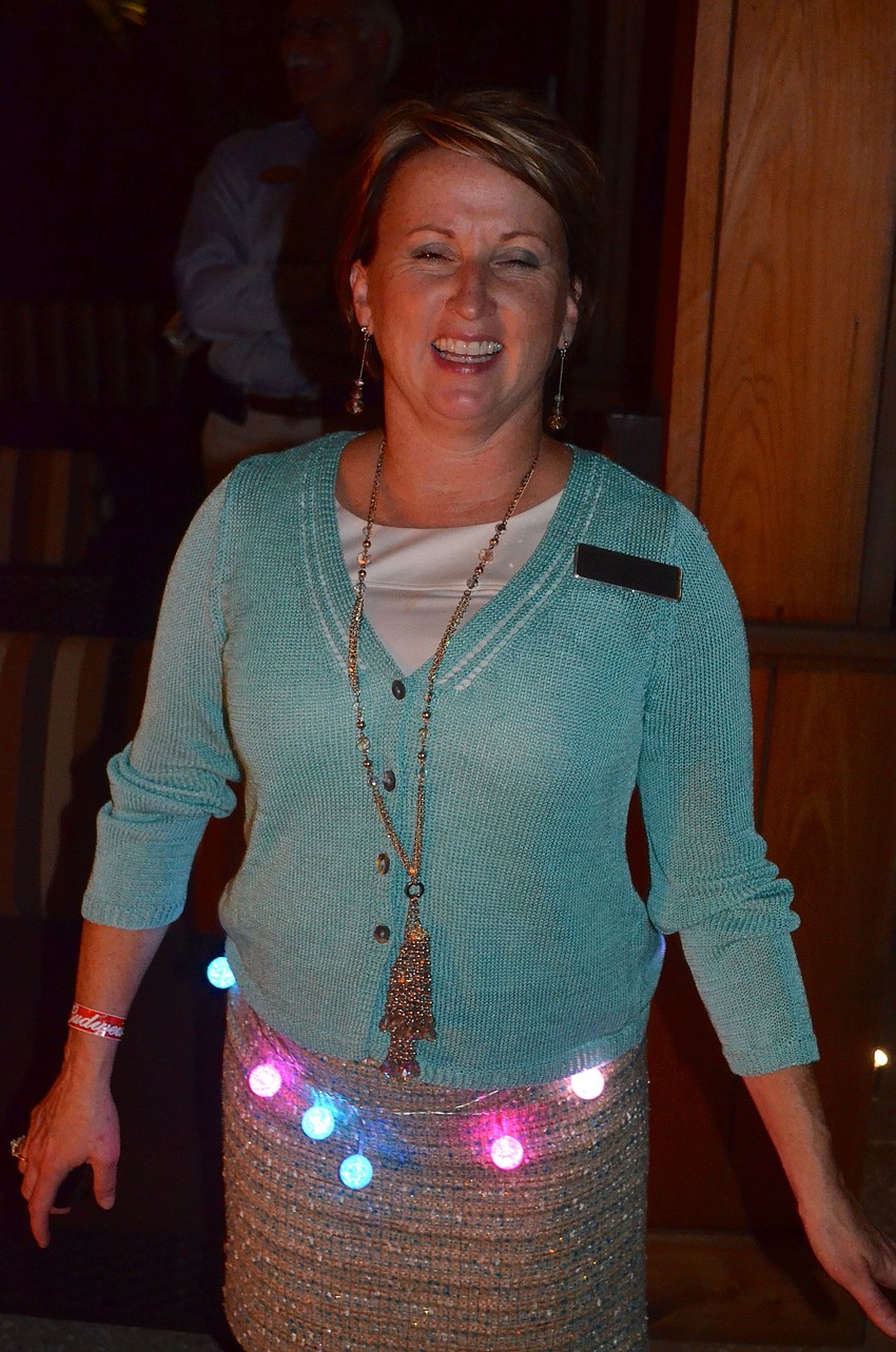 Judy Athari laughs as she's chosen for the best accessory award.