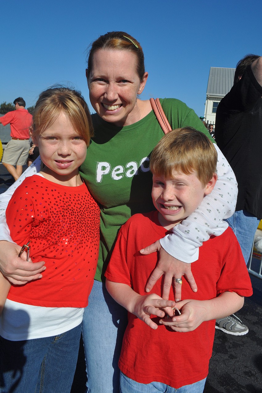 Kerri Whitehead, center, comes with her children, Addison, left, and Avary, right.