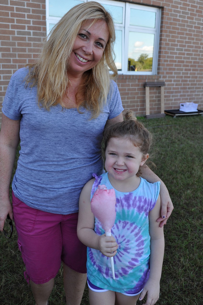 Holly Higgins enjoys the afternoon with her daughter, Izzy, 5.