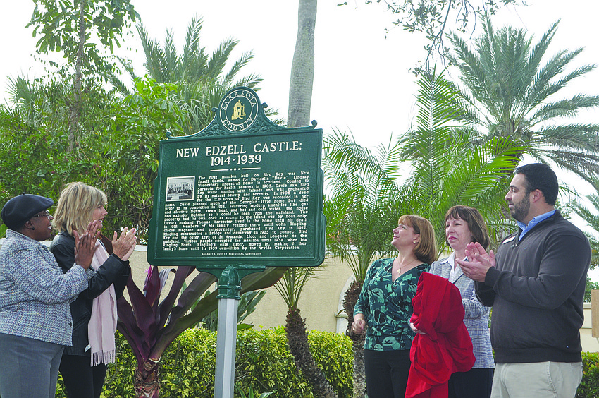 Sarasota County Commissioner Carolyn Mason, Sarasota Mayor Suzanne Atwell, Charlene Creel, Ruthmary Williams and Sarasota County Historical Commission Chairman Russ Gutmann celebrate the unveiling of Bird Key's historic marker Jan. 5.
