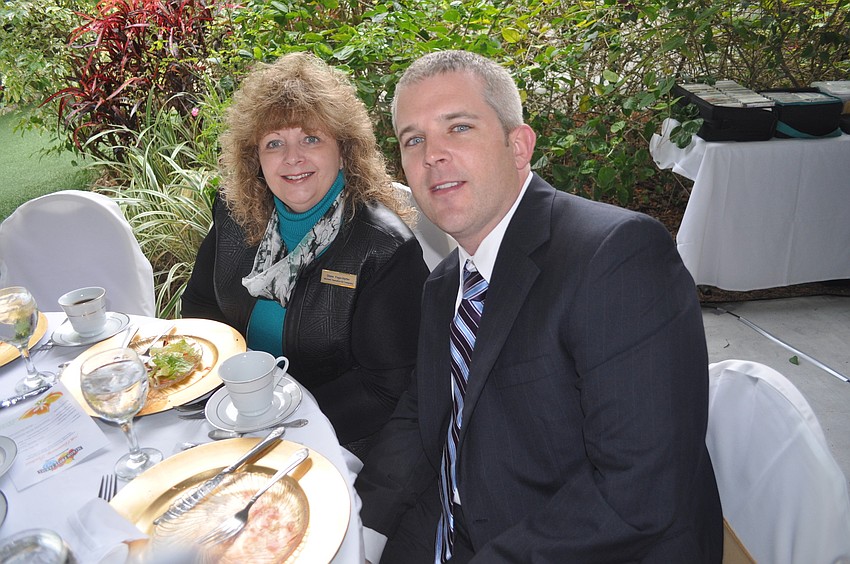 Diane Fogo-Harter of Michael Saunders and Kris Wise of Island Mortgage