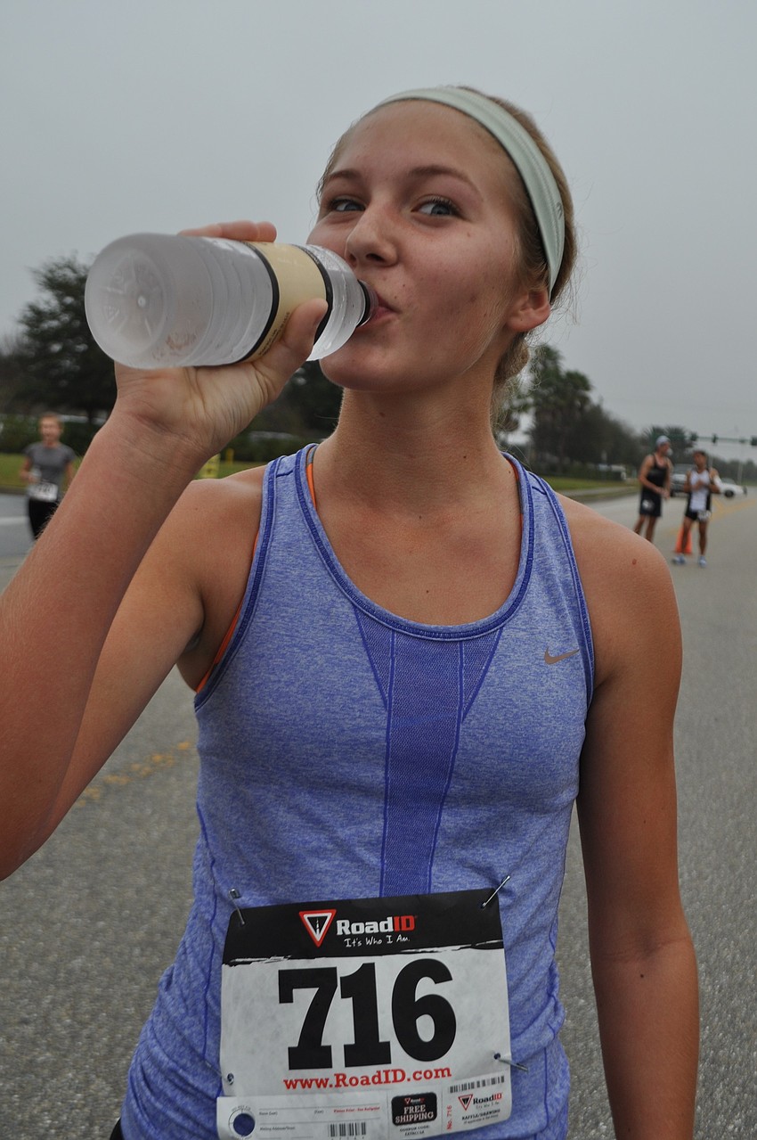 Ande McDonald, of Lakewood Ranch High School's track program, is the first girl to finish.