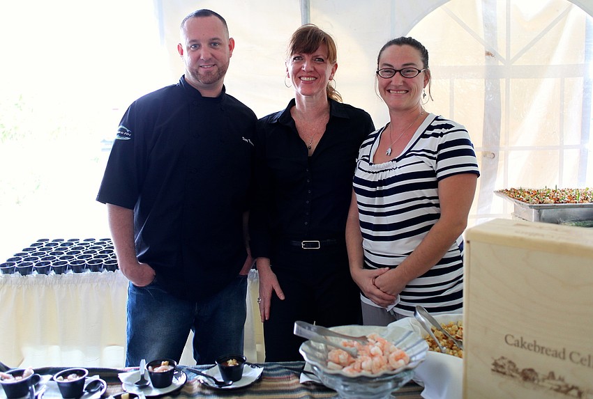 Crab & Finâ€™s Troy Torman, April Scott and Holly Oâ€™Mara serve up samples from the St. Armandsâ€™ restaurant.