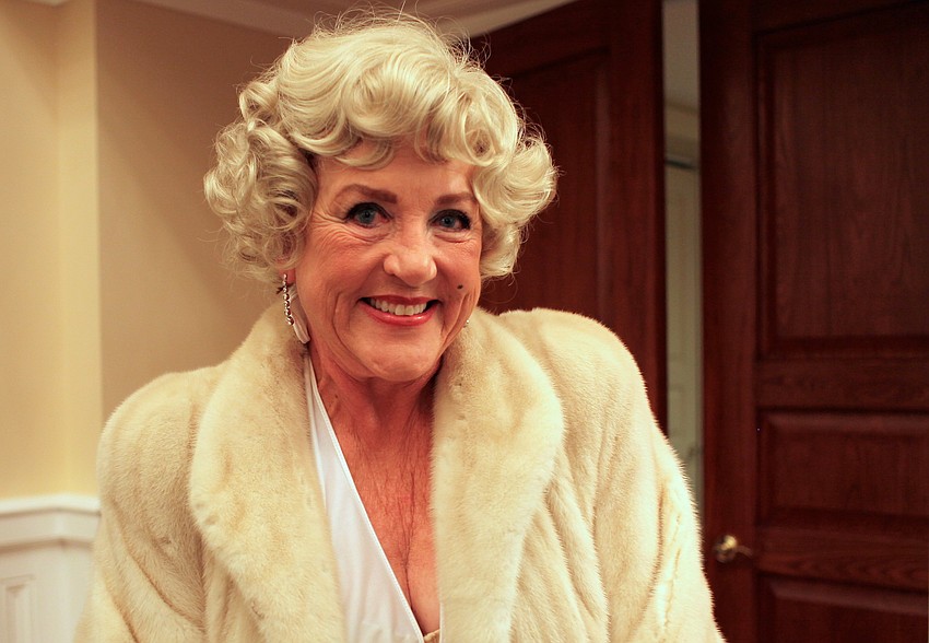Rebecca Taylor greeted partygoers at the door as Marilyn Monroe.