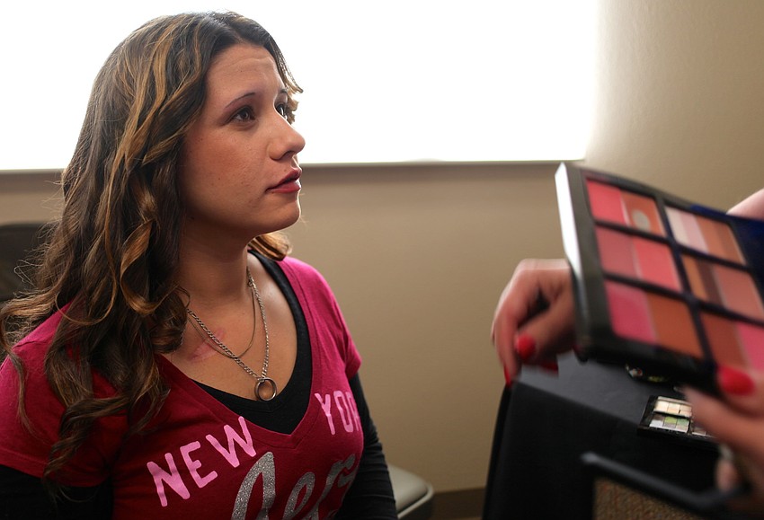 Kim Lightfoot gets her makeup done for the show.