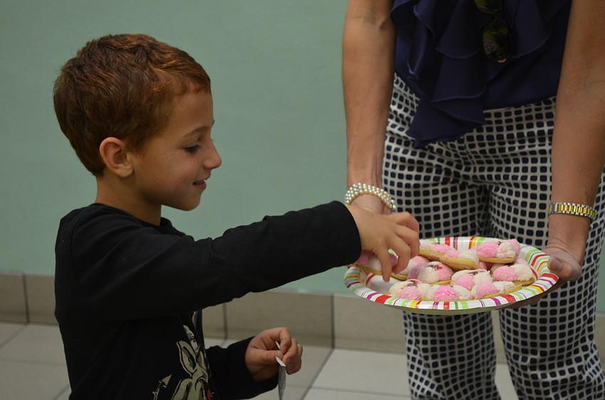 Wayne Boatwright has a â€œgalletaâ€ or cookie for dessert.