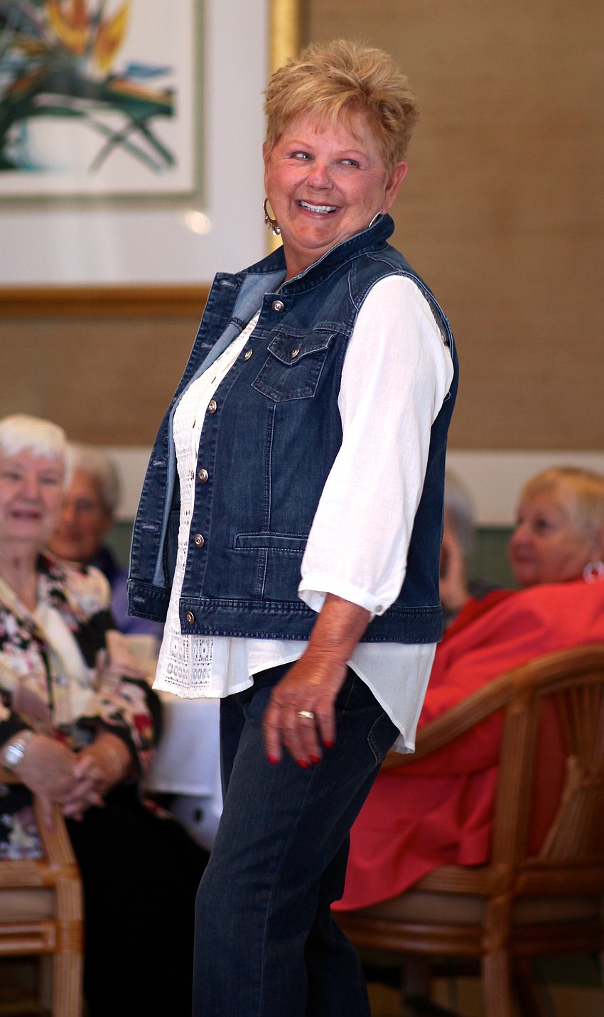 Maureen Whelan shows off a double denim look for the crowd.