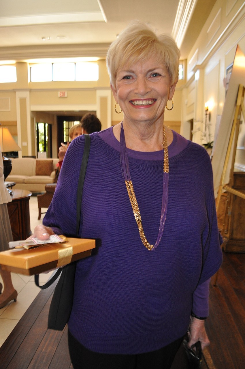 Judy Stumm wins a box of chocolates for drawing queen of hearts.