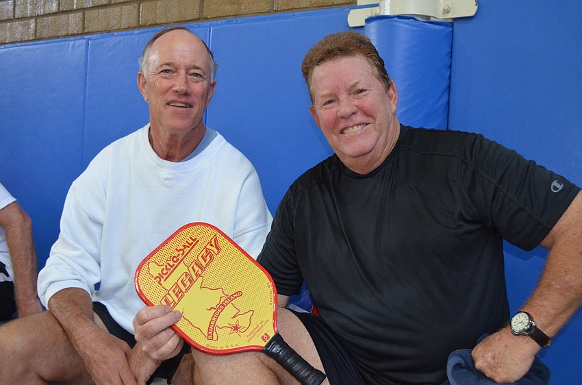 Glen Richardson and Terry Wingate rest after a game.
