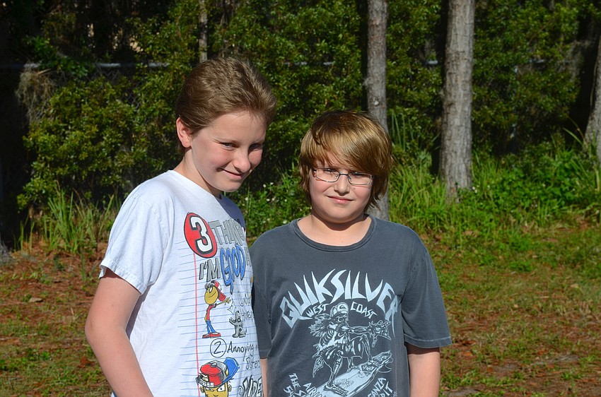 Eleven-year-olds Ryan Barringer and Joe Shaw enjoy time outside.