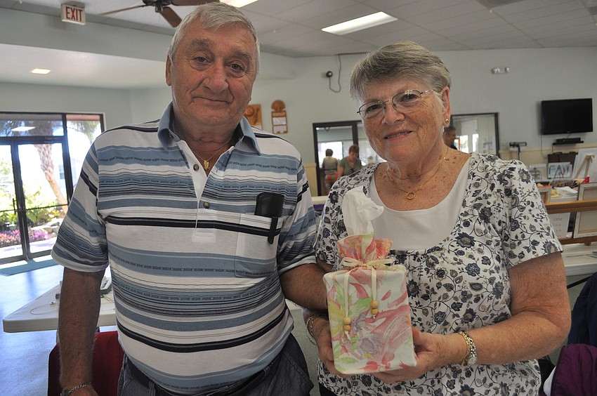 Gene Gelinas with his wife, Janet, who sewed the cover of a tissue box