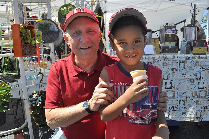 John Alexander and Israel Samedi, 6, of the Big Brothers Big Sisters of the Sun Coast