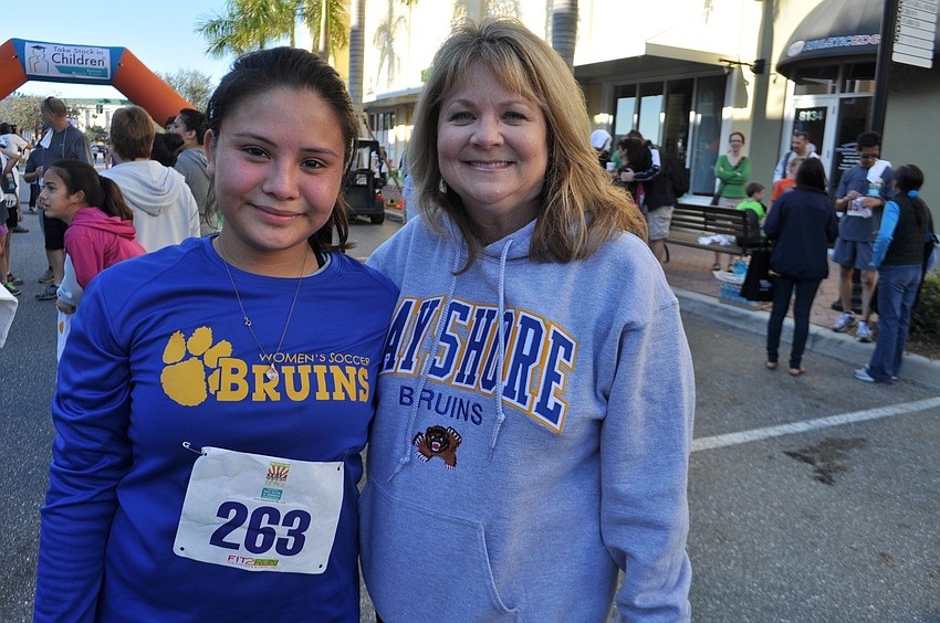 Take Stock scholarship recipient Sofia Gallegos poses with her mentor, Laura Roberts.