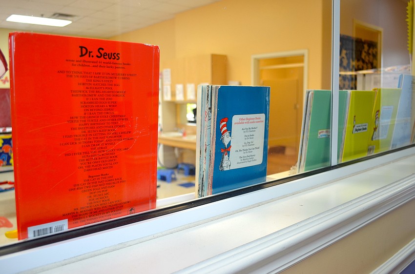 Kiddie Academy teachers read Dr. Seuss stories to their students.
