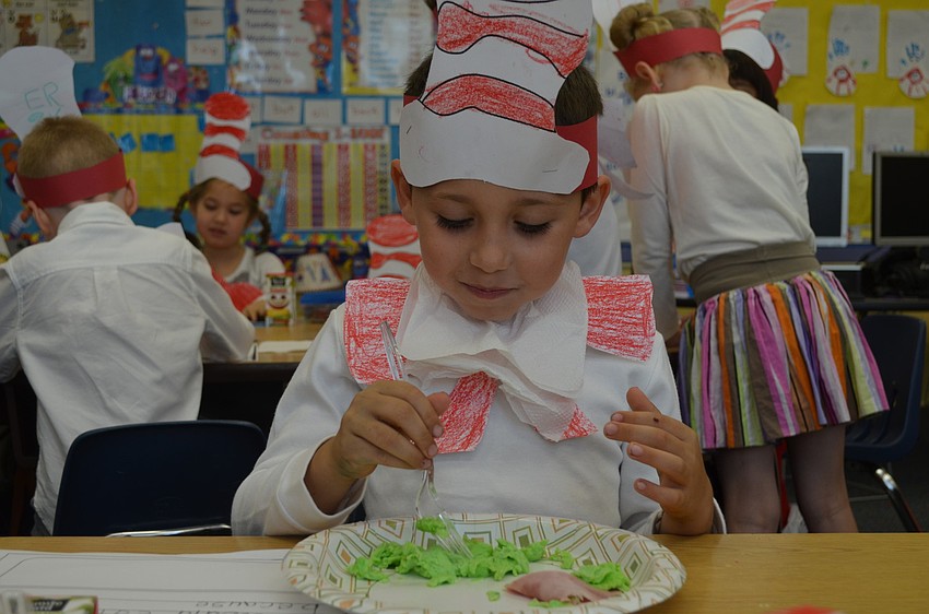 Hunter Heise enjoys his breakfast.