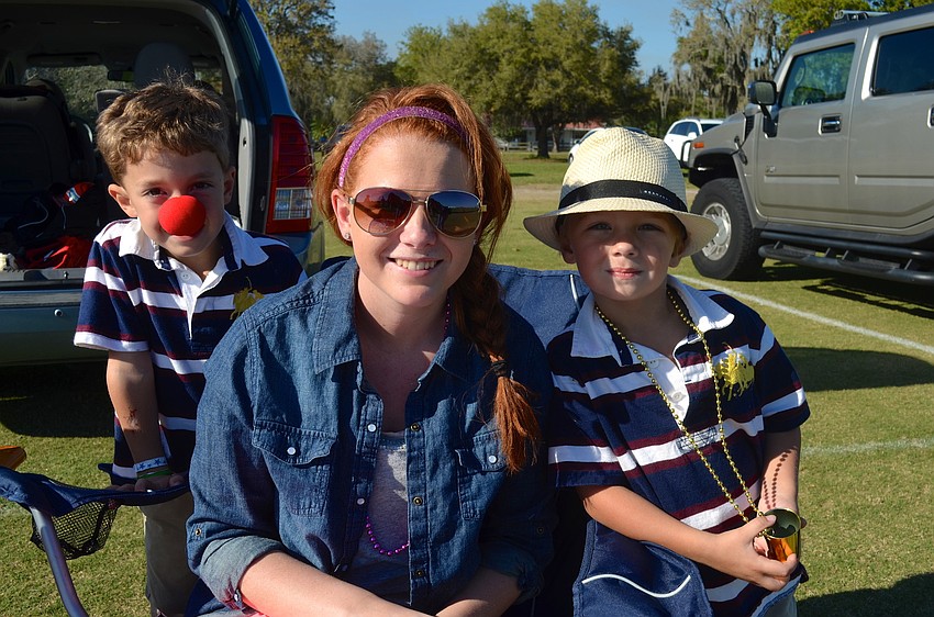 Wilson Shaw, 5, spends time with his cousin, Allie Wood, and his brother, Fallon Shaw, 4.