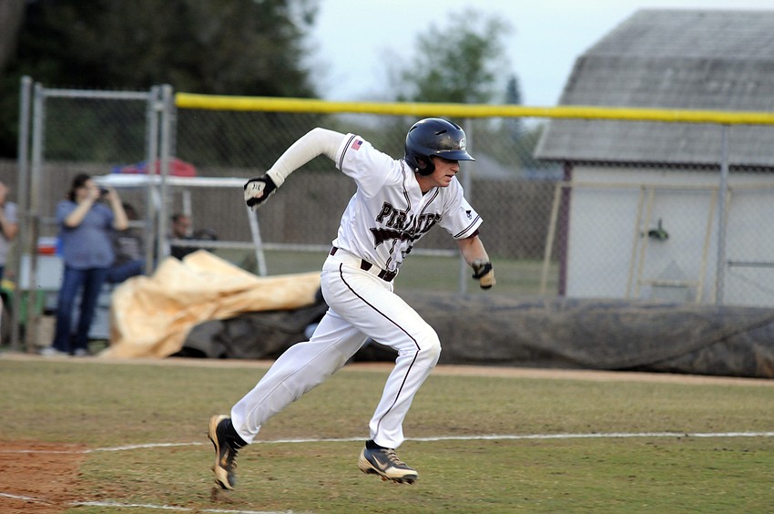 Braden River senior Kyle Buser races down the first base line.