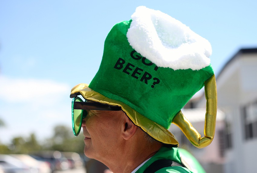 Jim Kryway wears his â€œGot Beer?â€ hat to show his St. Patrickâ€™s Day spirit.