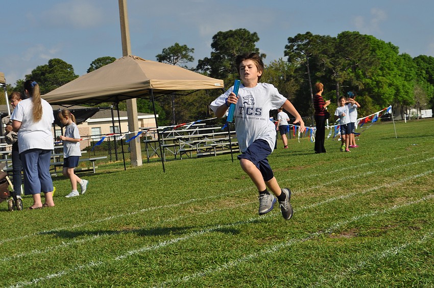 Maison Montgomery runs as fast as he can.