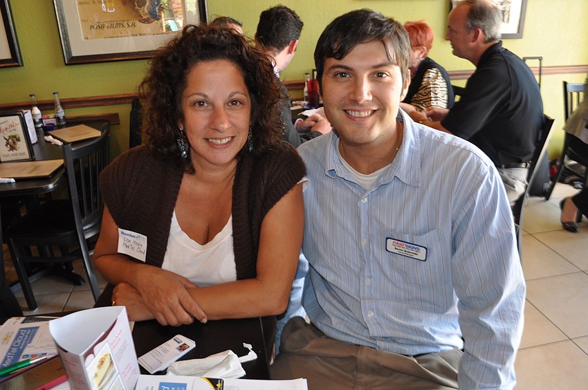 Lisa Hodo, of MedTel Services, with Kevin Bojewski, of FASTSIGNS