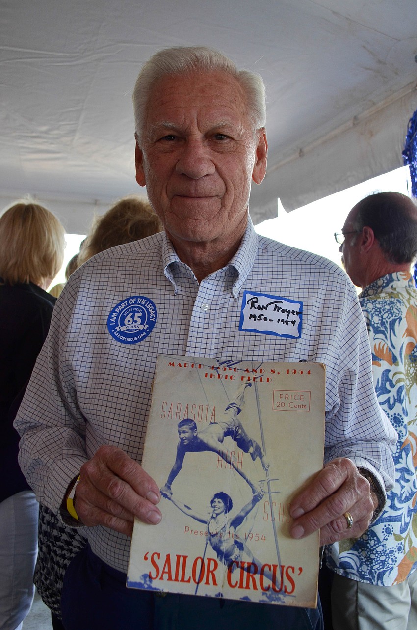 Dr. Ron Troyer in Sailor Circus from 1950 to 1954. Here heâ€™s posing with a magazine from that time featuring him on the cover. Following Sailor Circus, Troyer did the flying circus at Florida State University.