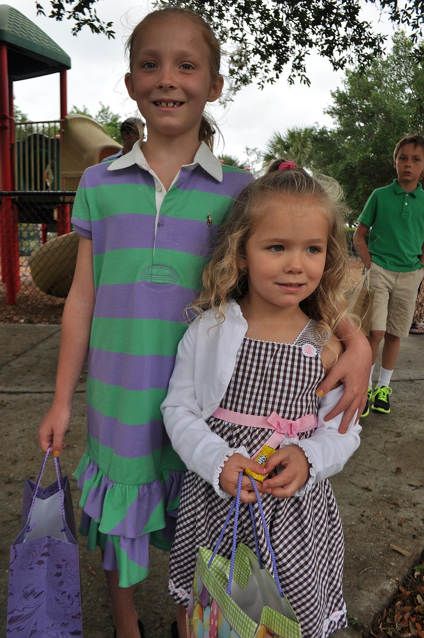 Sisters Megan and Keelan Thomsen enjoy the morningâ€™s festivities.