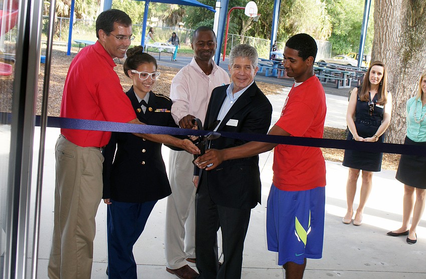 David LaCamera, Maria Monroy, Ken Waters, Tom Shapiro and Matthew Graham cut the ribbon. (Courtesy photo)