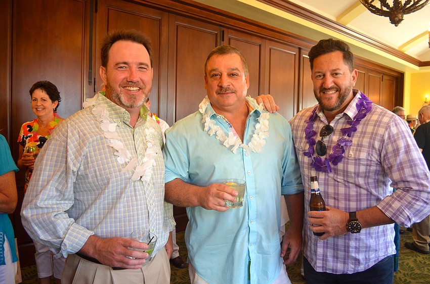 Mark Wicke, Jim Kinder and Scott Leavitt keep their manly look despite their new accessories.