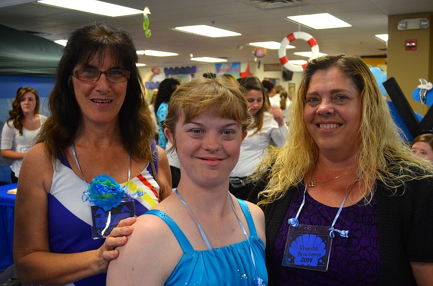 Karen Moss and her daughter, Alyssa, with Rhonda Bronkemp.