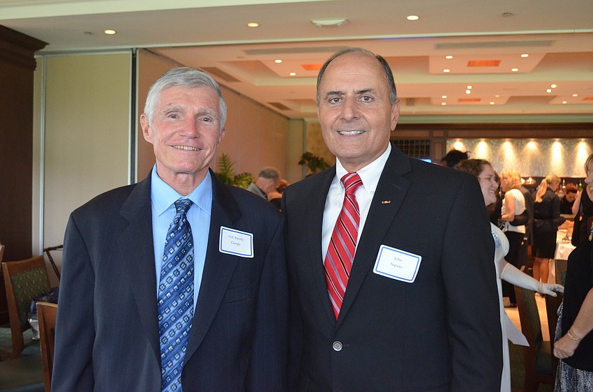 Guest speaker Col. Randy Gangle with honoree Col. John Saputo
