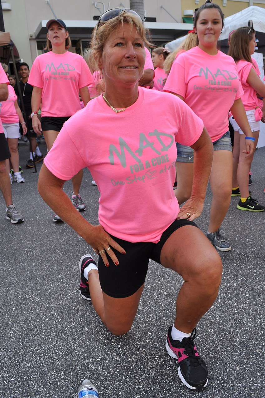 Teri Kennedy did some warmup exercises.