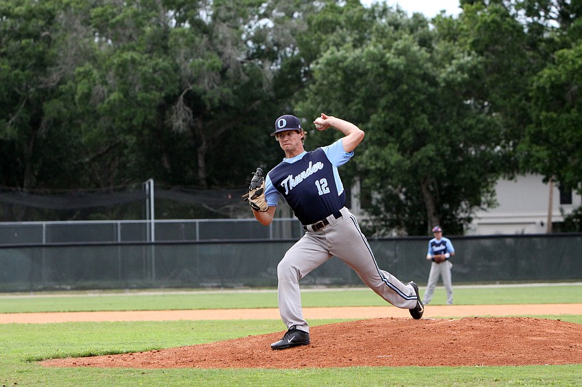 Out-of-Door Academyâ€™s Austin Hoppe, No. 12, pitches.