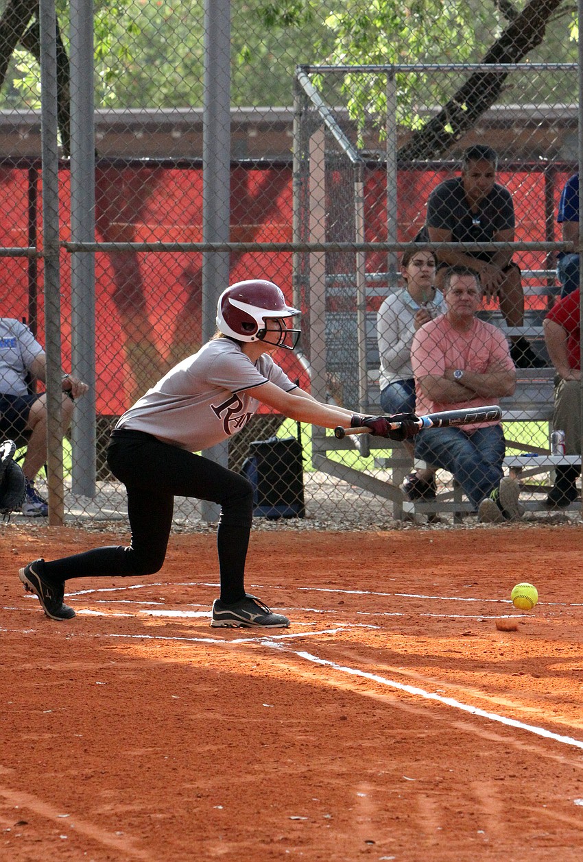Riverviewâ€™s Stephanie Kouvatsos, 8, bunts.
