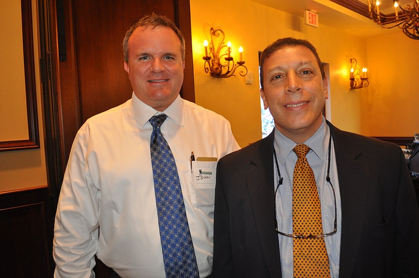 John Freeman of Raymond James and Joseph Najmy of Najmy Thompson Attorneys at Law