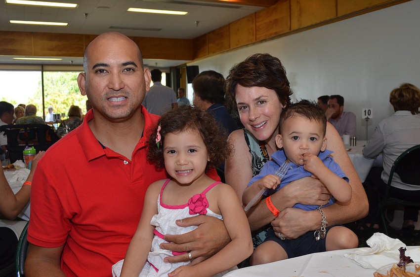 Mike DeGuzman with his daughter Beatrice, wife Jill and son Holden