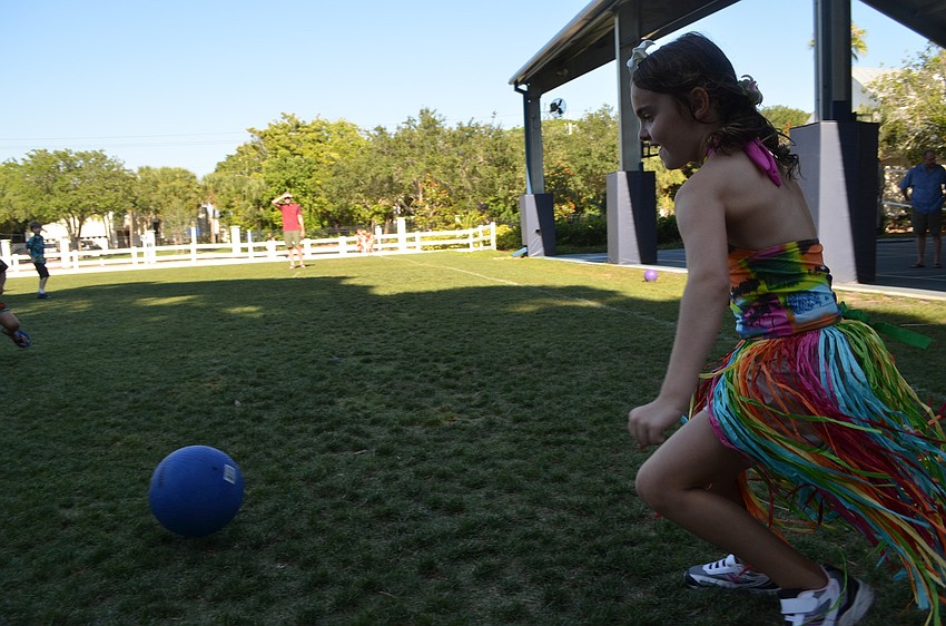 Roxy G. gets ready to kick the ball during a second grade game of kickball.